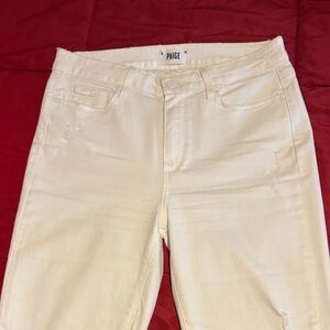 PAIGE Women's White Skinny Jeans highly distressed.